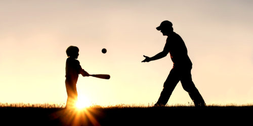 father son playing baseball